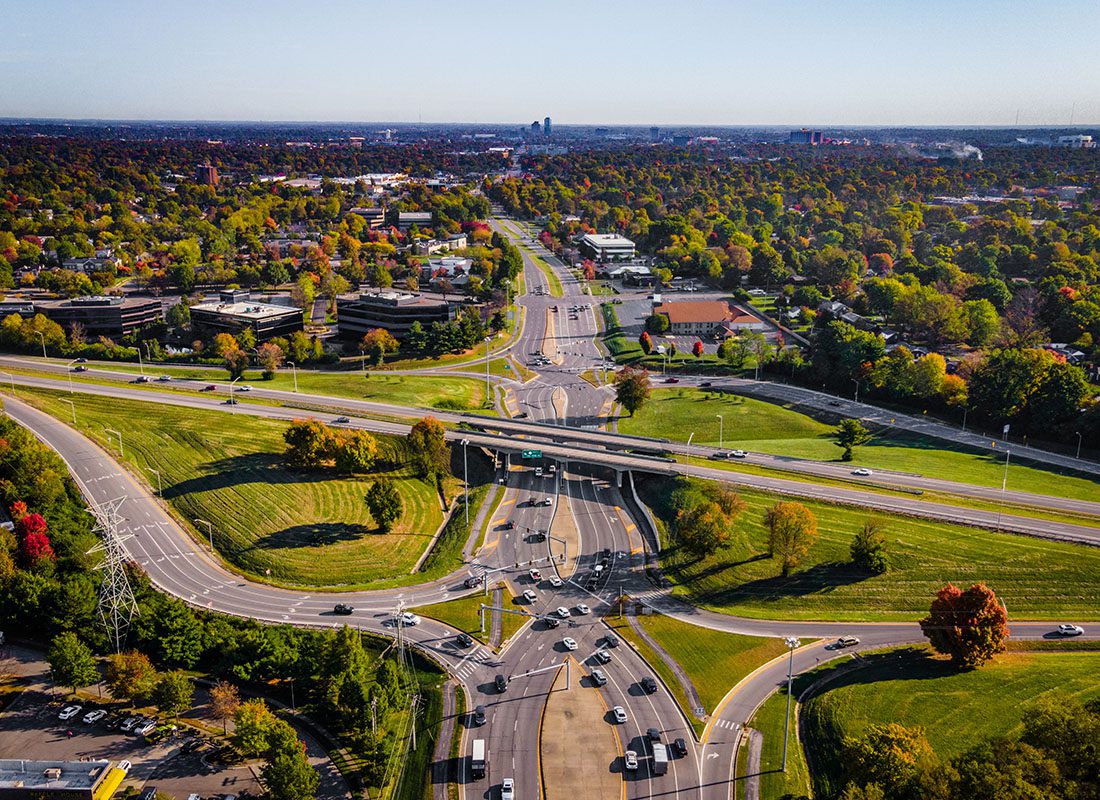 Service Center - Aerial View of Diverging Highways Surrounded by Homes Commercial Buildings and Colorful Fall Foliage in Lexington Kentucky